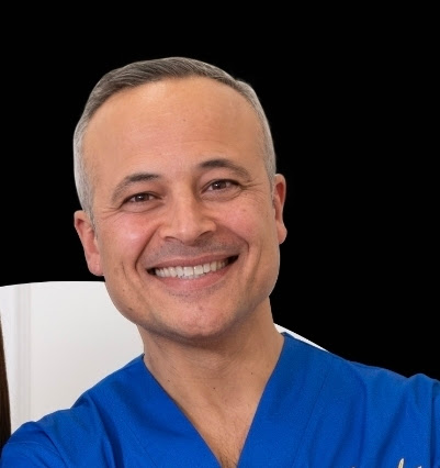 Dott. Maurizio Saturno in camice operatorio